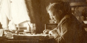 Reger at desk